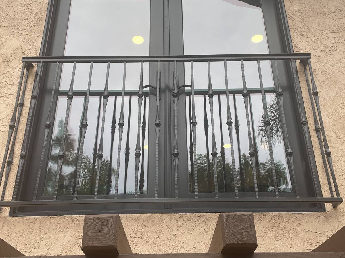 Juliet balcony railing with twisted pickets