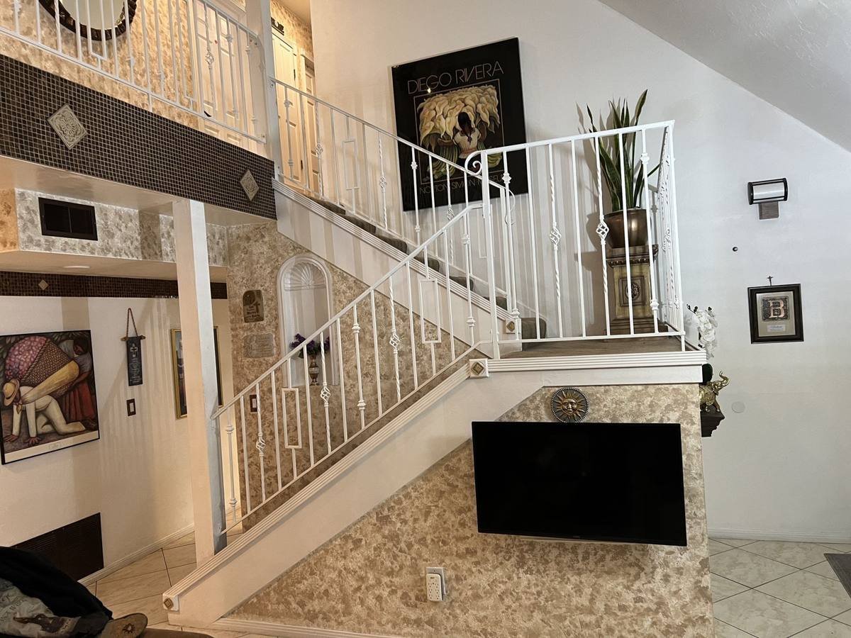 White ornamental staircase handrail