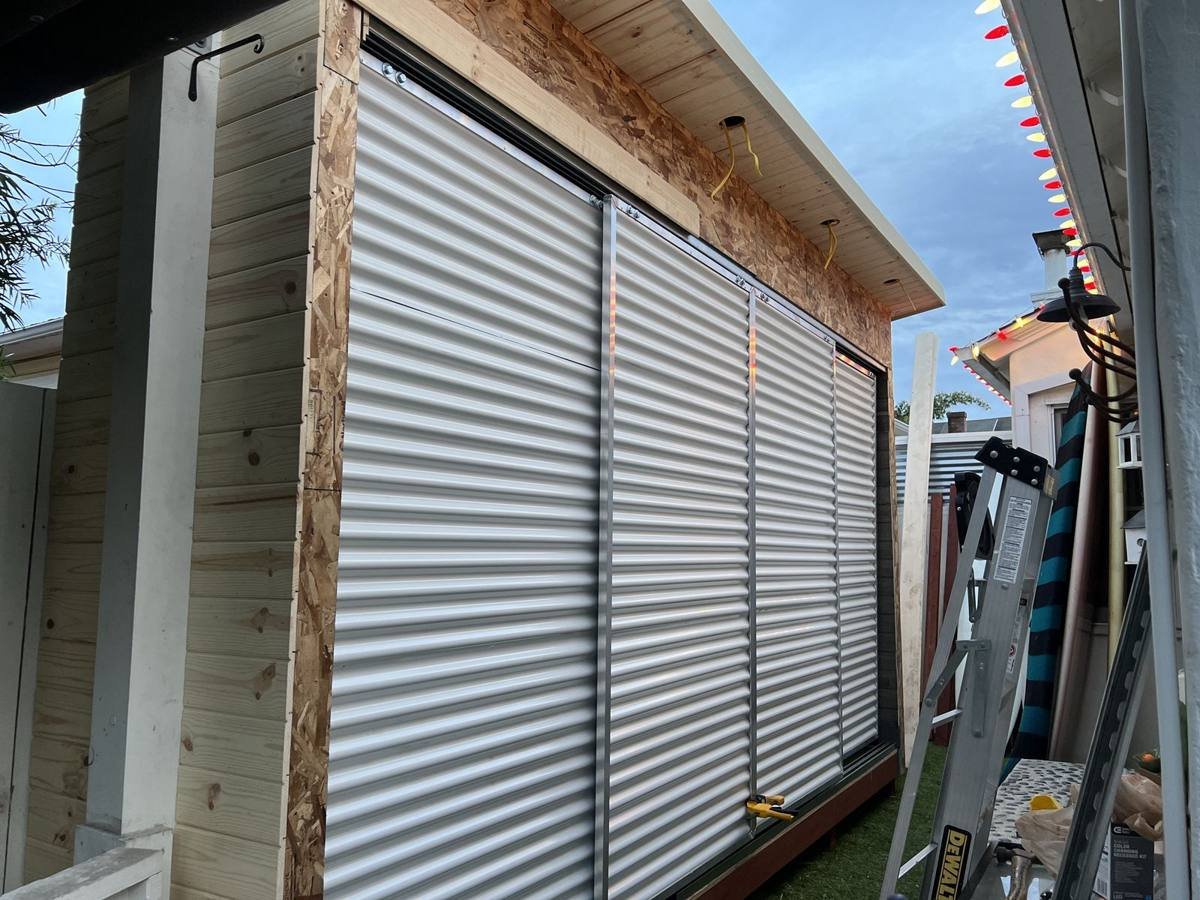Corrugated steel sliding barn doors