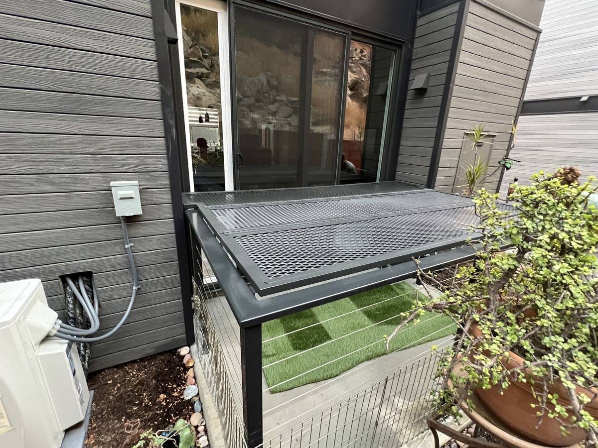 Steel patio awning with expanded-metal roof